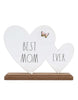 Load image into Gallery viewer, Frontal angle of the heart-shaped sign with a mom theme. All elements in the picture are clearly distinguishable from this angle: the two white wooden hearts, with the larger one displaying the term &quot;Best Mom&quot; and the smaller one featuring the word &quot;Ever,&quot; forming the phrase &quot;Best Mom Ever.&quot; The butterfly on the larger heart and the natural wooden base are also noticeable. The background of the picture is white.
