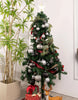 Load image into Gallery viewer, Lifestyle picture of the set of 50 black and silver Christmas tree ornaments. The ornaments are arranged on a Christmas tree. It can be appreciated that the 50 ornaments are enough to fully decorate a tree.
