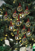 Load image into Gallery viewer, Second lifestyle pictures of the clear glass tree balls. It is a closer view of the first lifestyle picture, focusing only in the ornaments hanging on the tree. In this closer view, it stands out the sparkling effect that is reflected on the ornaments, which is produced by the lights emitted from the bulbs that are on the Christmas tree.
