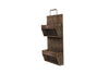 Load image into Gallery viewer, Side view of the wall-mounted dark wood letter holder. From this angle, it stands out the shape of the two compartments from the side: They have an inverted trapezoid-like shape. The background of the picture is white.
