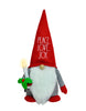 Load image into Gallery viewer, Front angle of the light up Christmas gnome. In this angle it can be fully noticed that candle the gnome is holding, as well as the terms &quot;Peace, Love, Joy&quot; on its hat.
