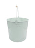 Load image into Gallery viewer, Side view of the spinning pen holder. What stands out most from this angle is the pale green color with its glossy finish. The background of the photo is white.
