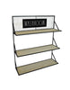 Load image into Gallery viewer, Side angle picture of the &quot;Washroom&quot; wall-mounted shelving organizer, presented from a slight left angle. From this angle, all its features are visible:  three tiers, black metal frame, light wooden shelves, mesh on top, and the black plaque with the phrase &quot;Washroom&quot; in white Rae Dunn font. The background of the picture is white.

