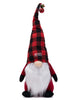 Load image into Gallery viewer, Front angle picture of the Rae Dunn Christmas Gnome. From this angle, it can be fully appreciated its red and black checkered hat that has the term &quot;Merry&quot; on it.
