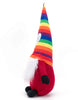 Load image into Gallery viewer, Side angle of the Rae Dunn gnome. The colorful hat stands out from this view, grabbing the attention with its rainbow colors.
