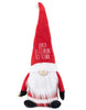Load image into Gallery viewer, Front angle of the Santa-theme gnome. In this angle, it can be fully appreciated the phrase &quot;Santa is Coming to Town&quot;.
