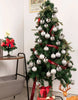 Load image into Gallery viewer, Lifestyle picture of the set of 40 silver-color tree decorations. The ornaments are hung on a Christmas tree. It can be appreciated that the 40 ornaments are enough to fully decorate the tree.
