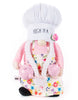 Load image into Gallery viewer, Front angle of the spring-themed gnome. From this perspective, its main features can be fully appreciated: the pink teapot and pink cup, the beige apron with flowers drawn on it, the white braids, and the chef hat with the term &quot;High tea&quot; on it. The background of the picture is white.
