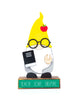 Load image into Gallery viewer, Front view of the teacher-themed wooden gnome. It is placed in a standing position. From this angle, its main features can be appreciated: Its gnome-type body, the book held on the right hand, the glasses, the apple on the yellow pointy hat, and the wooden base with the green plaque that features the terms &quot;Teach, Love, Inspire.&quot; Lastly, the background of the picture is white.
