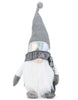 Load image into Gallery viewer, Frontal angle of the winter gnome. From this angle it is fully notable the term &quot;Let it Snow&quot; on its hat and the ski goggles.
