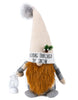 Load image into Gallery viewer, Front angle of the winter gnome that holds a lantern. From this angle, it can be appreciated the phrase &quot;Dashing Through The Snow&quot; on the bottom part of its hat.
